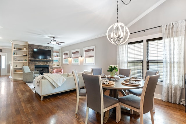441 Highpoint Ter, Brentwood, TN 37027 - dining area with a ceiling fan, ornamental molding, a stone fireplace, a chandelier, and dark wood-style floors
