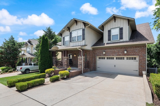 441 Highpoint Ter, Brentwood, TN 37027 - craftsman house with an attached garage, board and batten siding, concrete driveway, central AC, and brick siding