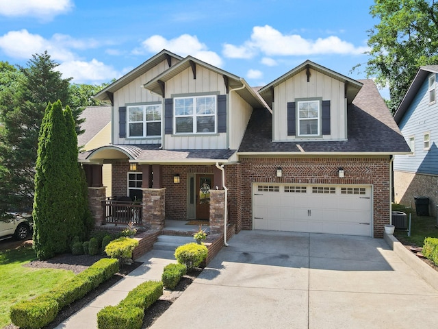 441 Highpoint Ter, Brentwood, TN 37027 - craftsman house featuring board and batten siding, a porch, concrete driveway, a garage, and brick siding