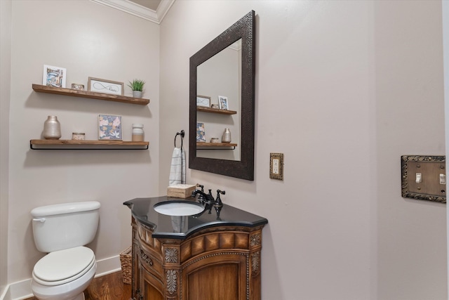 441 Highpoint Ter, Brentwood, TN 37027 - bathroom featuring ornamental molding, toilet, vanity, wood finished floors, and baseboards