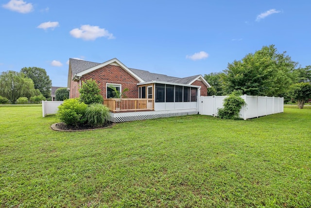 124 Mabry Dr, Murfreesboro, TN 37127 - rear view of house featuring a sunroom, brick siding, a deck, and a garage