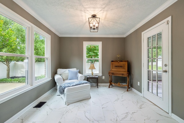 124 Mabry Dr, Murfreesboro, TN 37127 - living area with healthy amount of natural light, baseboards, a textured ceiling, light marble finish flooring, and crown molding