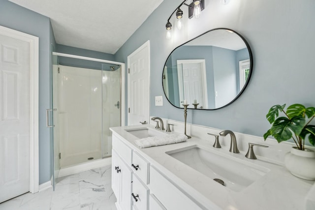 124 Mabry Dr, Murfreesboro, TN 37127 - bathroom with marble finish floors, a shower stall, and double vanity
