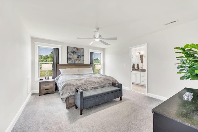 2734 Lakeland Dr, Nashville, TN 37214 - bedroom featuring light colored carpet, baseboards, ensuite bath, and a ceiling fan