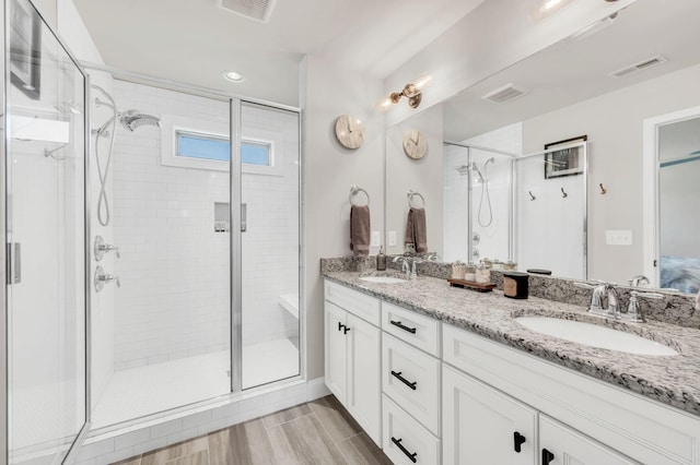 2734 Lakeland Dr, Nashville, TN 37214 - bathroom with double vanity, a stall shower, and recessed lighting