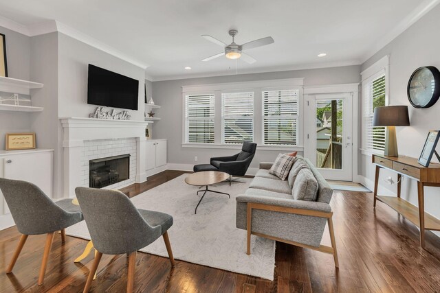 5407 Tennessee Ave, Nashville, TN 37209 - living room featuring a ceiling fan, crown molding, a fireplace, recessed lighting, and wood finished floors