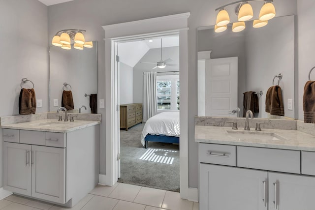 5407 Tennessee Ave, Nashville, TN 37209 - bathroom featuring lofted ceiling, two vanities, tile patterned floors, ensuite bathroom, and a chandelier