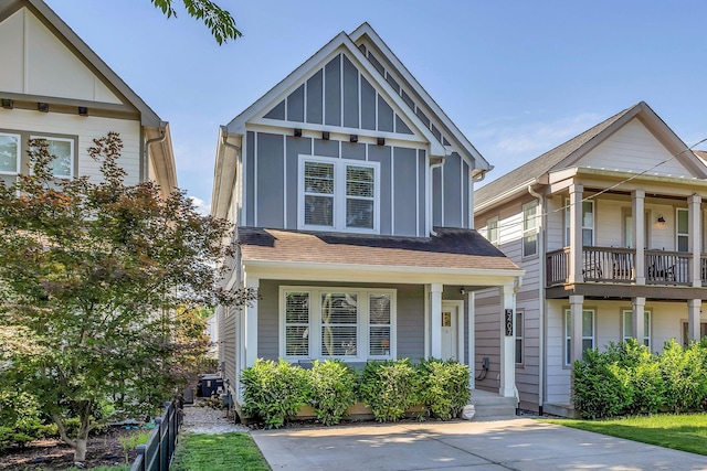 5407 Tennessee Ave, Nashville, TN 37209 - view of front of home featuring board and batten siding, roof with shingles, and a porch