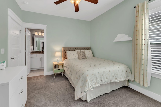 5407 Tennessee Ave, Nashville, TN 37209 - bedroom featuring light colored carpet, baseboards, a ceiling fan, and ensuite bathroom