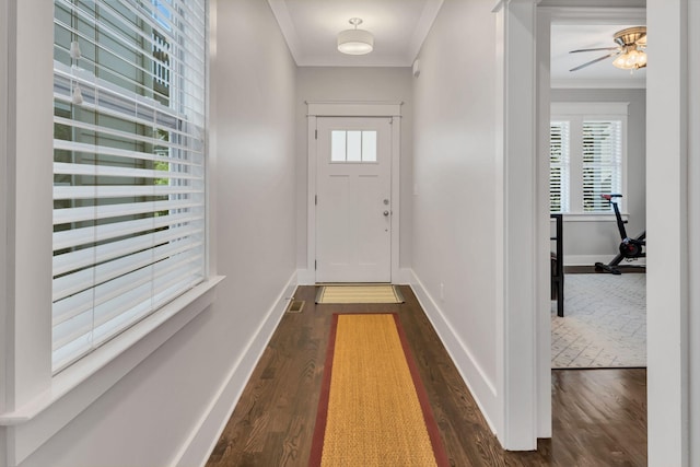 5407 Tennessee Ave, Nashville, TN 37209 - doorway to outside featuring crown molding, dark wood-style flooring, baseboards, and ceiling fan