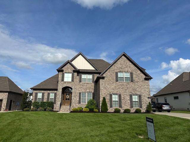 2713 Carousel Dr, Murfreesboro, TN 37128 - craftsman-style house with brick siding and a front yard