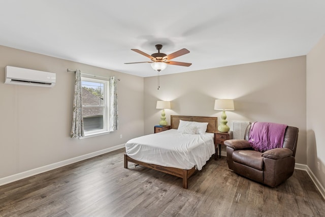 114 Eno Rd, Dickson, TN 37055 - bedroom featuring a wall mounted air conditioner, wood finished floors, and a ceiling fan