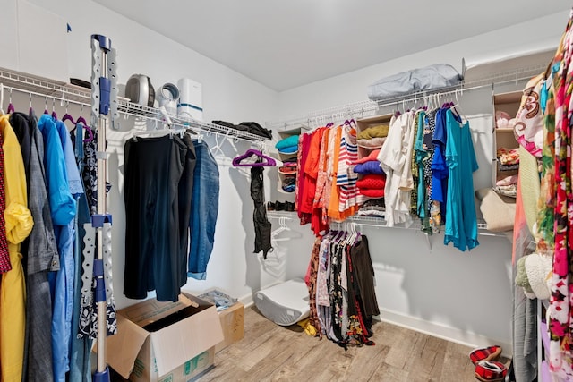 114 Eno Rd, Dickson, TN 37055 - spacious closet featuring wood finished floors