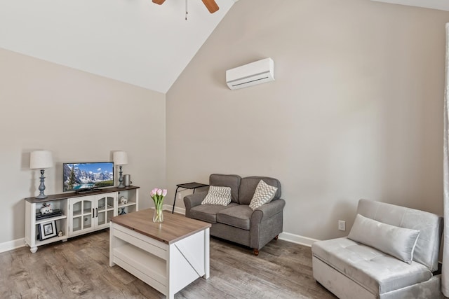 114 Eno Rd, Dickson, TN 37055 - living room featuring a wall mounted AC, a ceiling fan, light wood-style flooring, and high vaulted ceiling