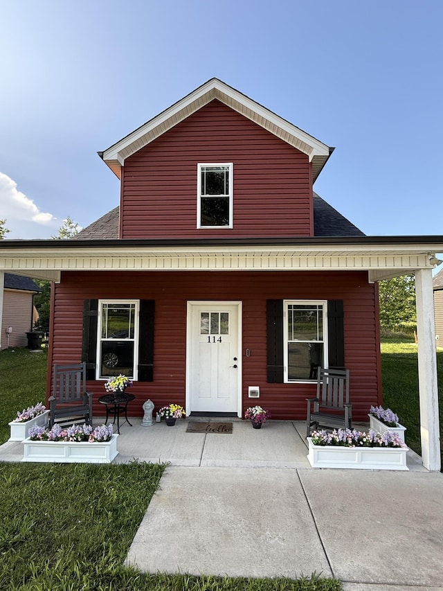 114 Eno Rd, Dickson, TN 37055 - back of house featuring a porch and roof with shingles