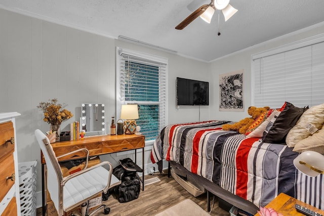 2106 Tunnel Blvd, Chattanooga, TN 37406 - bedroom featuring wood finished floors, ornamental molding, a textured ceiling, and ceiling fan