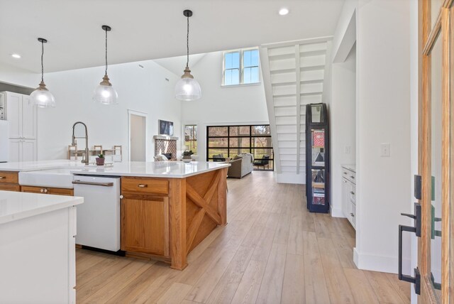 1222 Rock Church Rd, Dickson, TN 37055 - kitchen featuring dishwasher, a sink, light countertops, pendant lighting, and recessed lighting