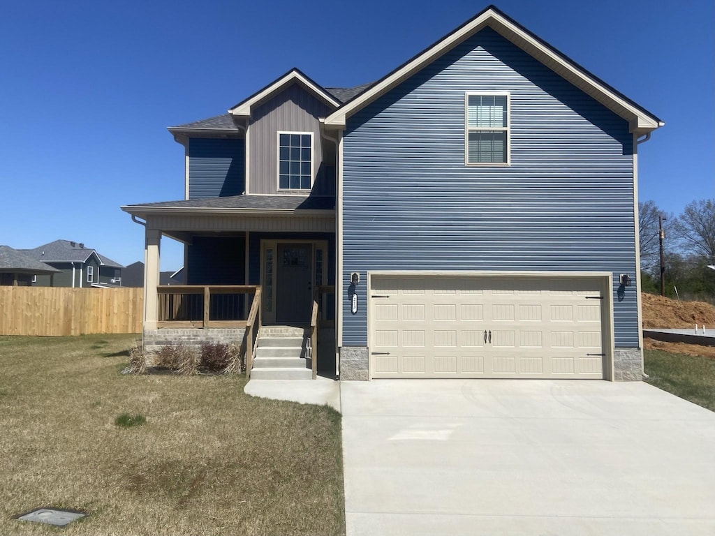 213 Wexford Way, Clarksville, TN 37042 - view of front facade featuring a porch, an attached garage, driveway, and board and batten siding