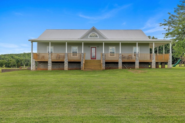 1034 Salem Rd, Lebanon, TN 37090 - view of front of house with metal roof, a front yard, a porch, and a playground