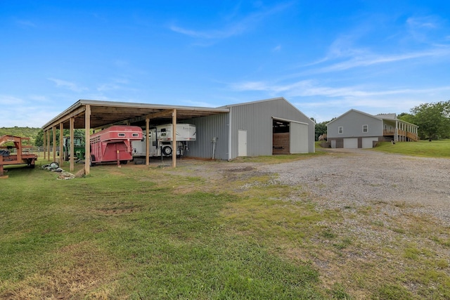 1034 Salem Rd, Lebanon, TN 37090 - view of pole building featuring a yard and gravel driveway