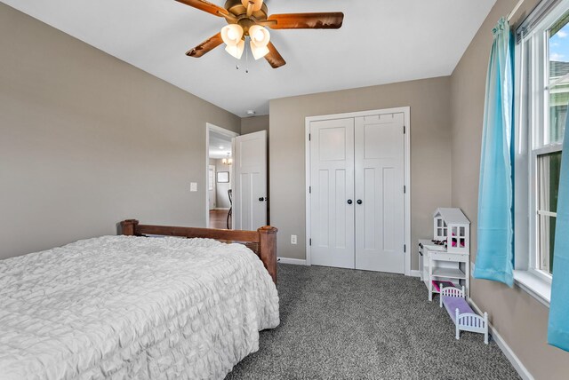 1310 Ray Broyles Rd, Sparta, TN 38583 - carpeted bedroom featuring a closet, baseboards, and ceiling fan
