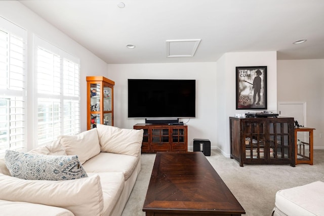 6050 Huntmere Ave, Franklin, TN 37064 - living area featuring light colored carpet, attic access, and baseboards