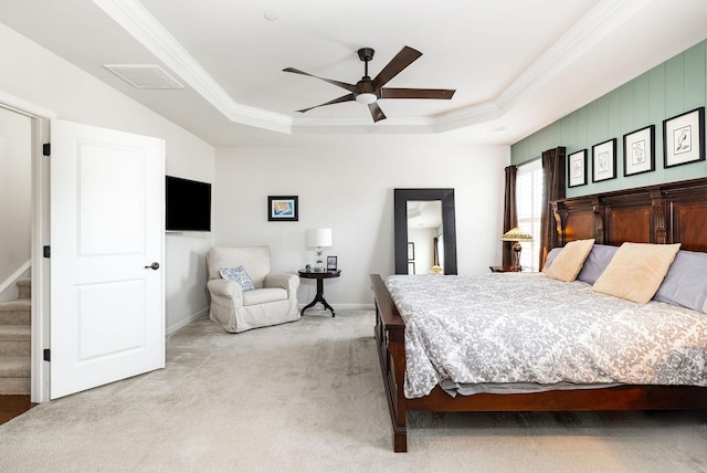 6050 Huntmere Ave, Franklin, TN 37064 - bedroom with a tray ceiling, light colored carpet, ornamental molding, a ceiling fan, and baseboards