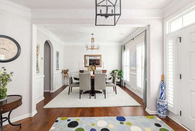 6050 Huntmere Ave, Franklin, TN 37064 - dining area featuring a chandelier, plenty of natural light, dark wood-type flooring, and crown molding