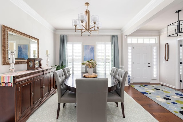 6050 Huntmere Ave, Franklin, TN 37064 - dining area featuring a chandelier, ornamental molding, light wood-type flooring, and baseboards