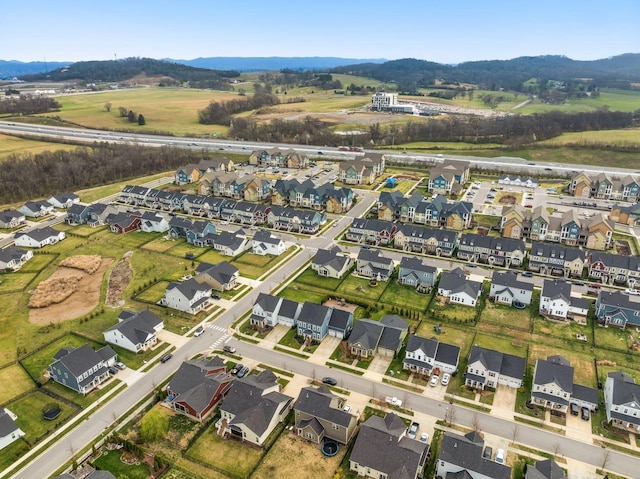 6050 Huntmere Ave, Franklin, TN 37064 - aerial view of property and surrounding area featuring nearby suburban area and a mountain backdrop