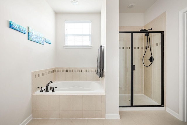 6050 Huntmere Ave, Franklin, TN 37064 - full bathroom featuring a garden tub, a shower stall, and tile patterned flooring