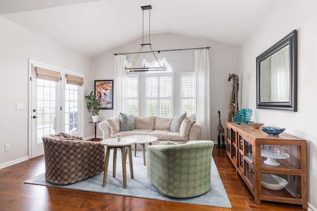 6050 Huntmere Ave, Franklin, TN 37064 - living room with a chandelier, vaulted ceiling, dark wood-type flooring, and baseboards