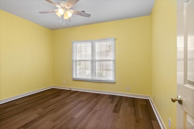 2101 Benton Hall Ct, Columbia, TN 38401 - spare room featuring wood finished floors, baseboards, and ceiling fan