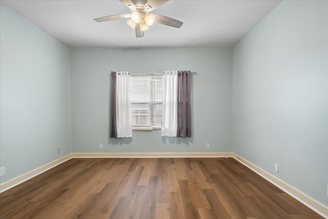 2101 Benton Hall Ct, Columbia, TN 38401 - unfurnished room featuring ceiling fan, wood finished floors, and baseboards