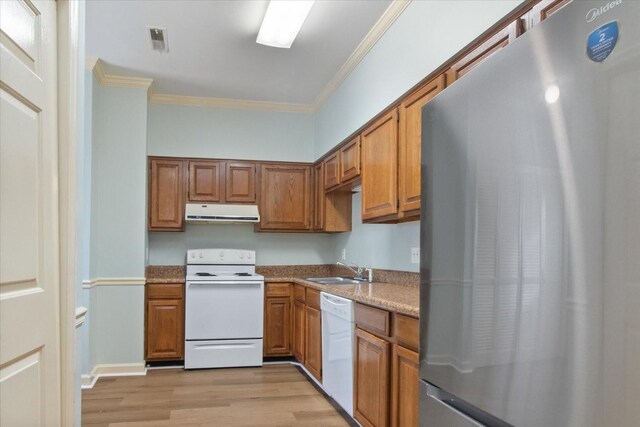 2101 Benton Hall Ct, Columbia, TN 38401 - kitchen with white appliances, exhaust hood, a sink, light wood-style flooring, and ornamental molding