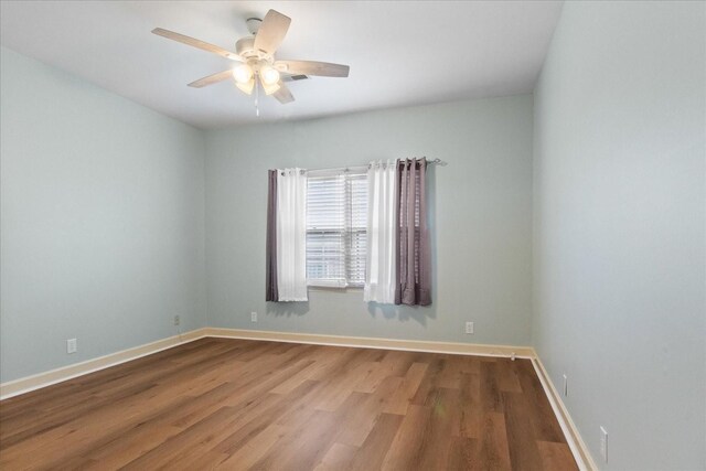 2101 Benton Hall Ct, Columbia, TN 38401 - unfurnished room with wood finished floors, a ceiling fan, and baseboards