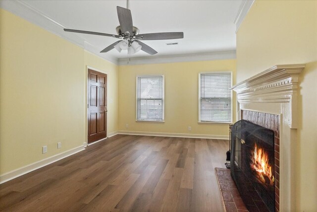 2101 Benton Hall Ct, Columbia, TN 38401 - living area with ornamental molding, dark wood finished floors, a ceiling fan, baseboards, and a brick fireplace