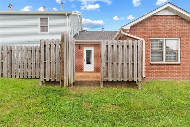 2101 Benton Hall Ct, Columbia, TN 38401 - rear view of house featuring brick siding and a shingled roof