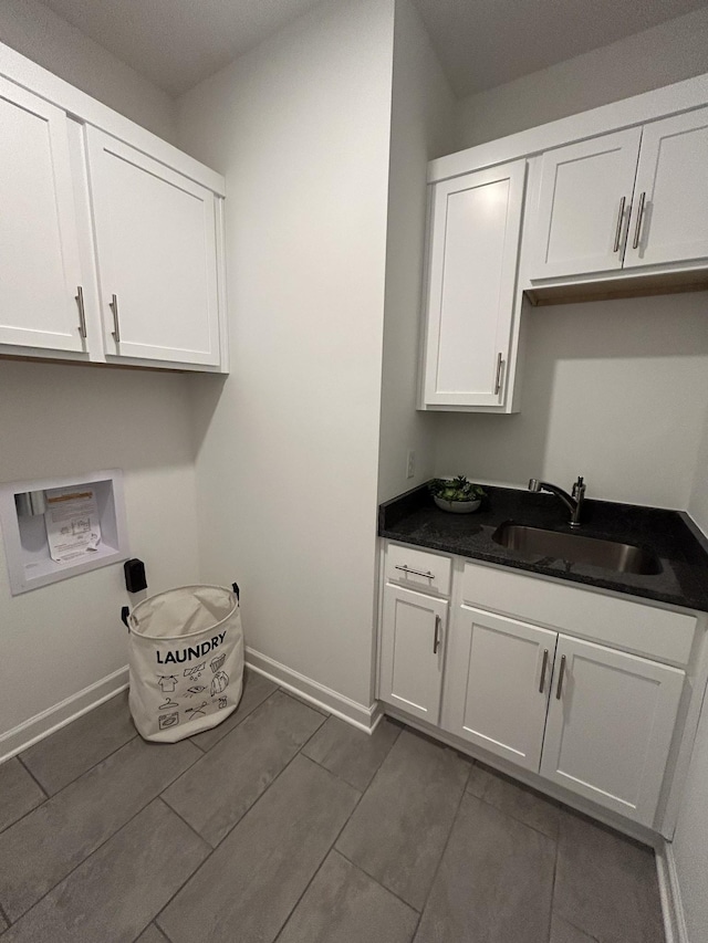 6705 Major Hutchings Dr, Hermitage, TN 37076 - washroom featuring cabinet space, hookup for a washing machine, and baseboards