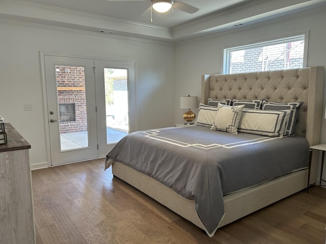 6705 Major Hutchings Dr, Hermitage, TN 37076 - bedroom with wood finished floors, access to exterior, a tray ceiling, crown molding, and ceiling fan