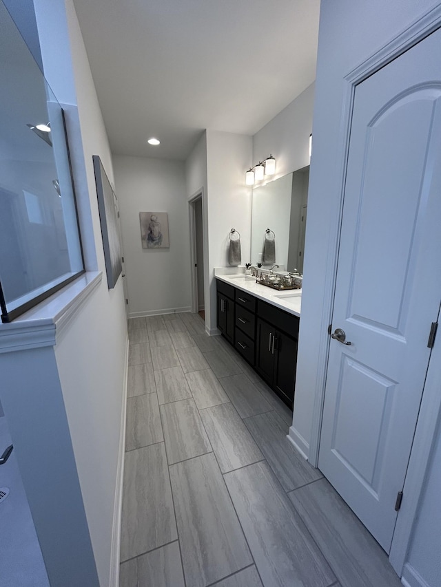 6705 Major Hutchings Dr, Hermitage, TN 37076 - full bath with double vanity, recessed lighting, and baseboards