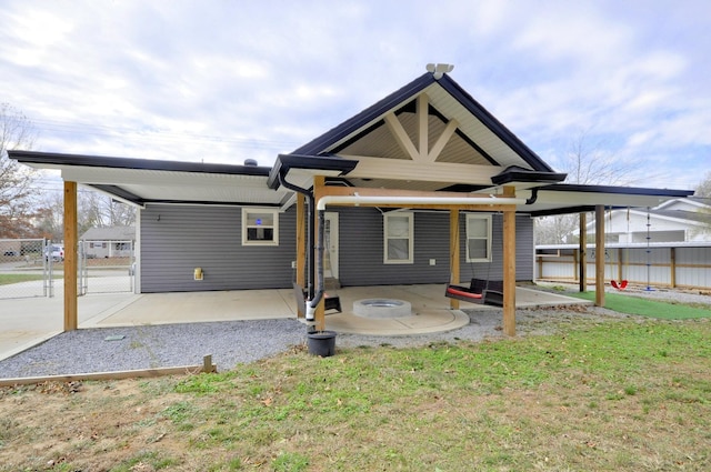 545 Donna Dr, Clarksville, TN 37042 - rear view of property with a carport, a gate, and a patio area