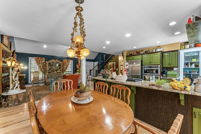 1313 Stayton Rd, Cumberland Furnace, TN 37051 - dining room featuring stairway, light wood-type flooring, recessed lighting, and a chandelier