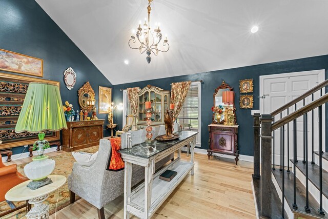 1313 Stayton Rd, Cumberland Furnace, TN 37051 - living room featuring a chandelier, lofted ceiling, wood finished floors, recessed lighting, and stairs
