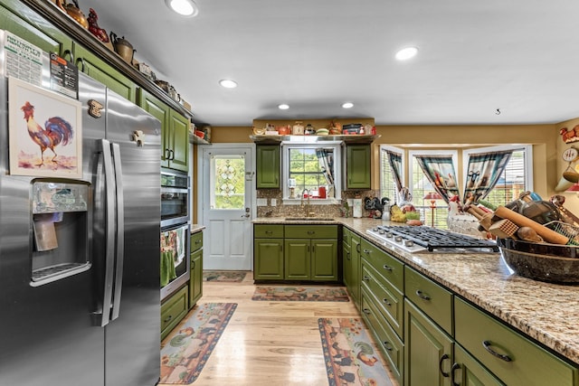 1313 Stayton Rd, Cumberland Furnace, TN 37051 - kitchen with green cabinets, stainless steel appliances, a sink, and recessed lighting