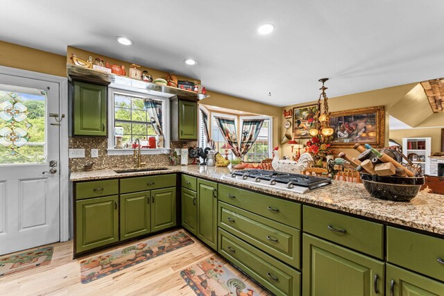 1313 Stayton Rd, Cumberland Furnace, TN 37051 - kitchen featuring stainless steel gas cooktop, a sink, light wood finished floors, healthy amount of natural light, and recessed lighting