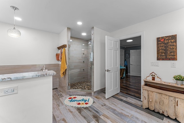 1313 Stayton Rd, Cumberland Furnace, TN 37051 - bathroom featuring a shower stall, wood finished floors, and recessed lighting