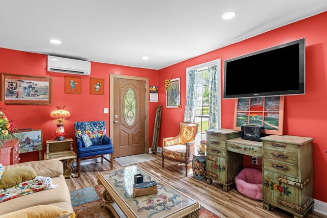 1313 Stayton Rd, Cumberland Furnace, TN 37051 - living room with a wall mounted AC, wood finished floors, and recessed lighting