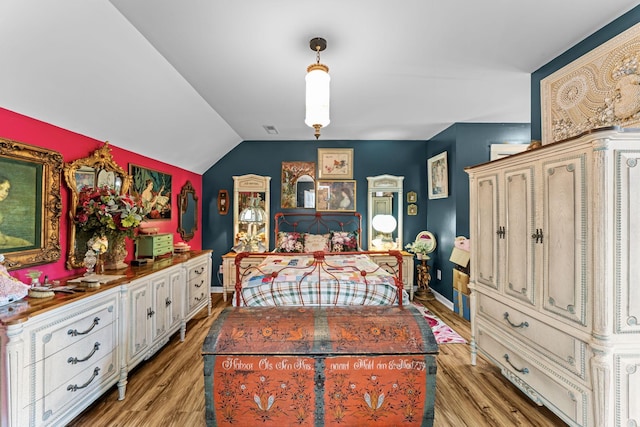 1313 Stayton Rd, Cumberland Furnace, TN 37051 - bedroom with light wood-style floors, baseboards, and lofted ceiling