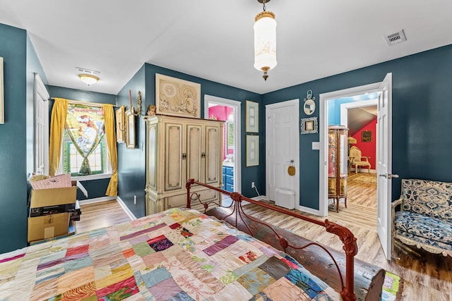1313 Stayton Rd, Cumberland Furnace, TN 37051 - bedroom featuring wood finished floors and baseboards